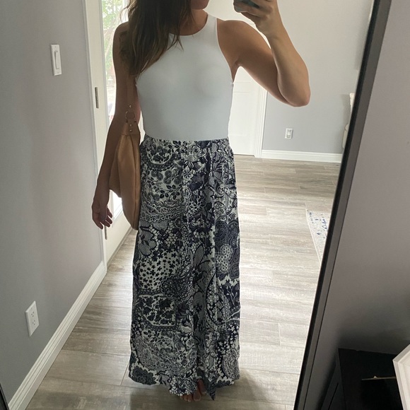 Dresses & Skirts - Floral printed skirt with elastic waist.  Unknown brand and no size tag